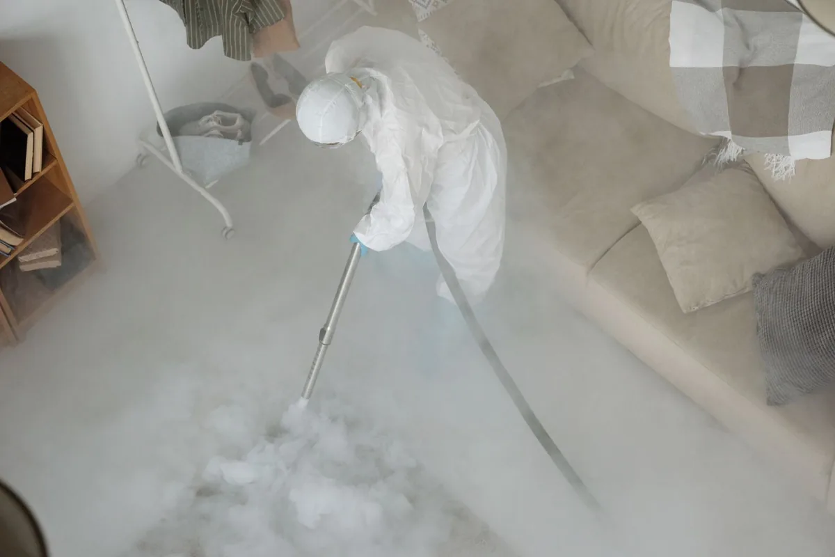 Biohazard cleanup technician in protective equipment, Donalsonville, GA